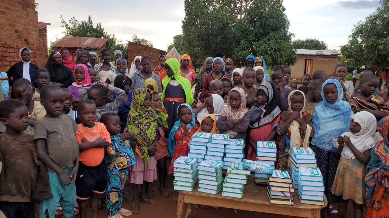 Families gathered for a Derma SG Quran distribution